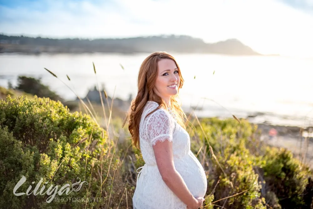 Expectant mother on the coastal bluff