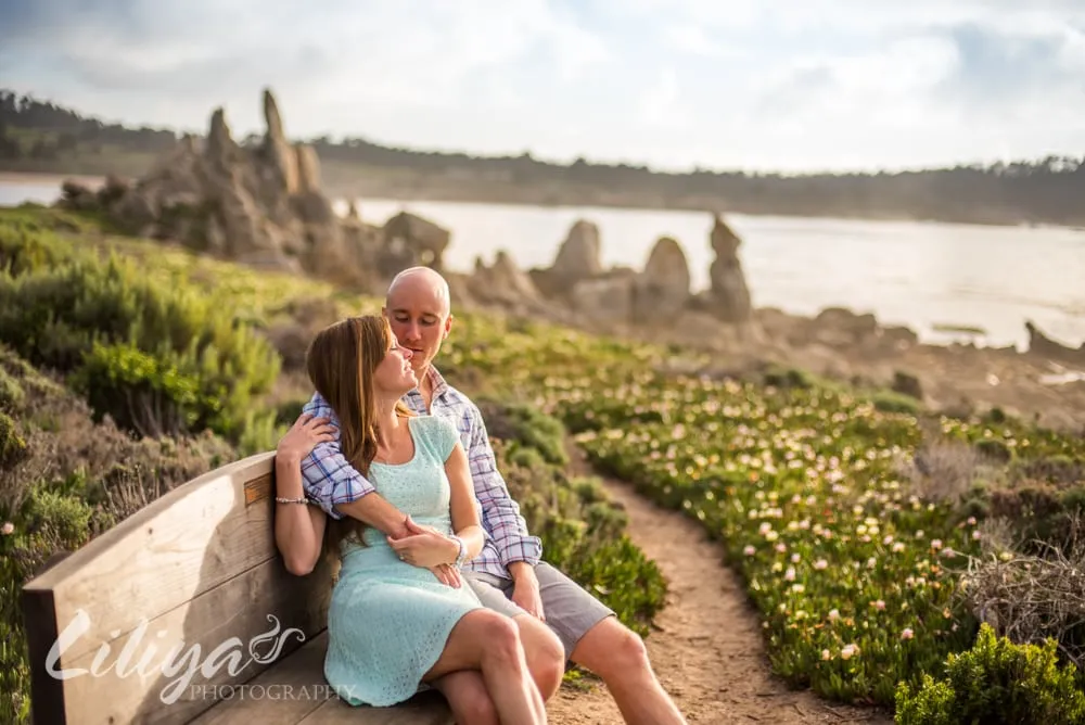 Mother and child on a coastal path at sunset