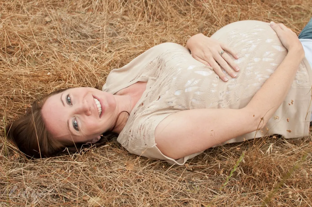 Expectant mother lying in the straw