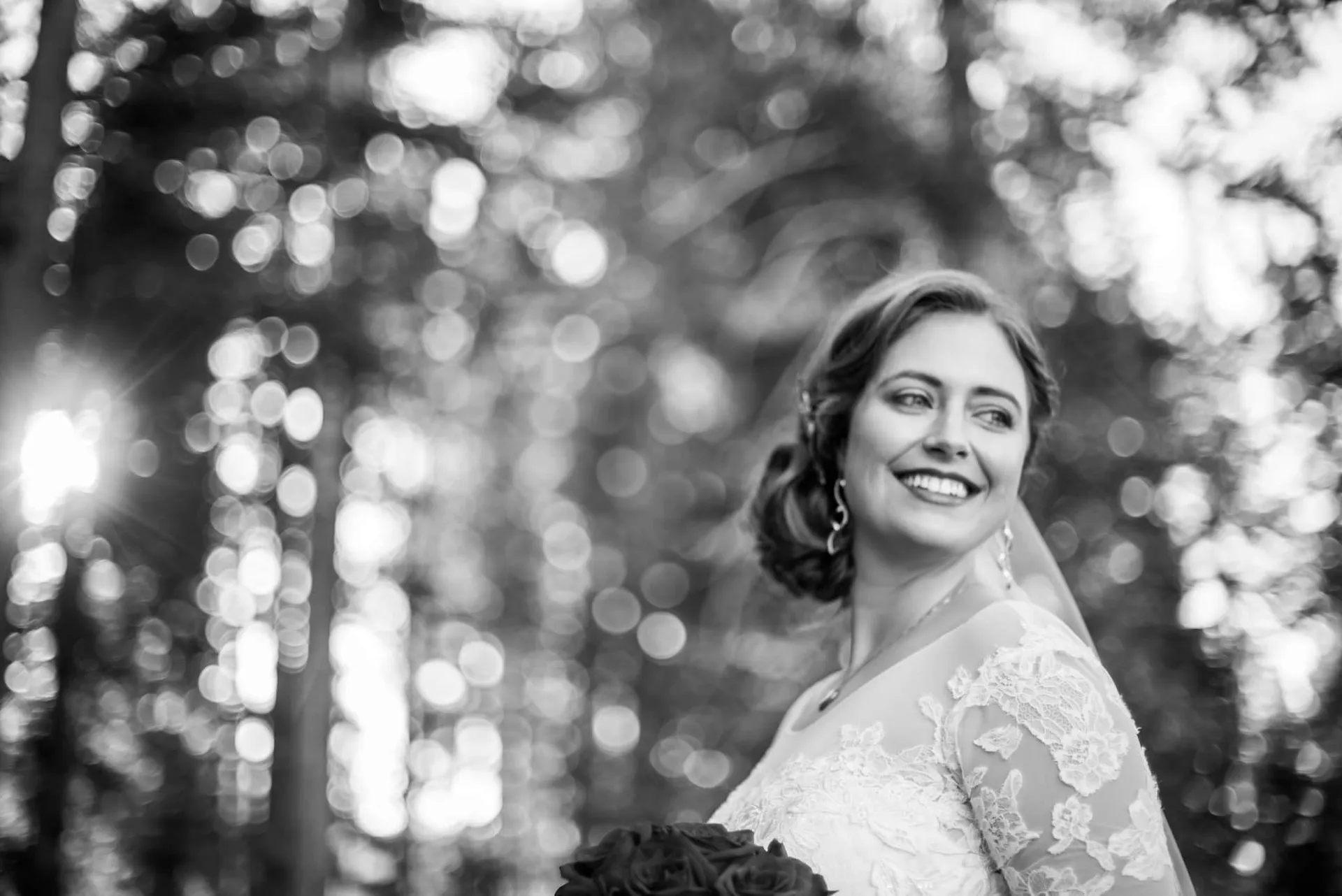 Bride photographed among the trees at a South Bay wedding